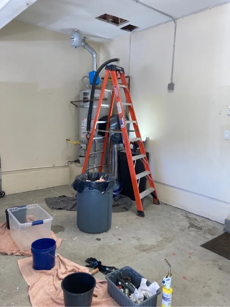 Water heater work in a garage